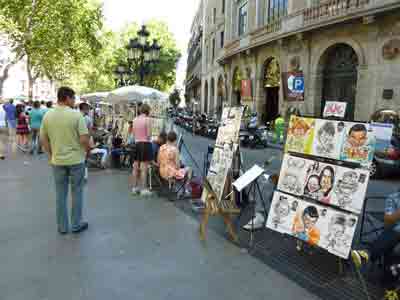 Portraitistes sur l'avenue de la Rambla