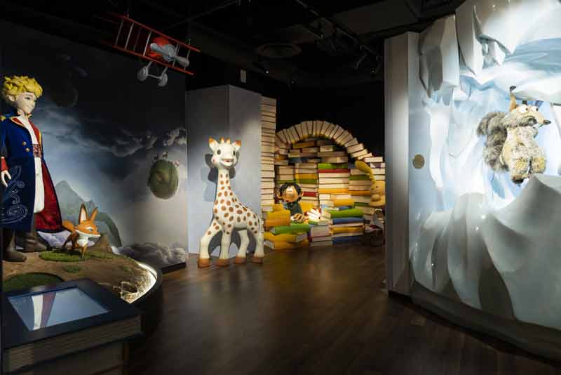 Statues de cire de Sophie la girafe, Titeuf, le petit prince et Gaston la gaffe au musée Grévin (Paris, France)